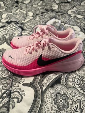 Nike Women's Pink Gradient Mesh Running Sneakers with Black Swoosh